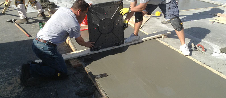 2. Maintaining a 4-7 slump range, pour and float the concrete and prepare for tile installation.